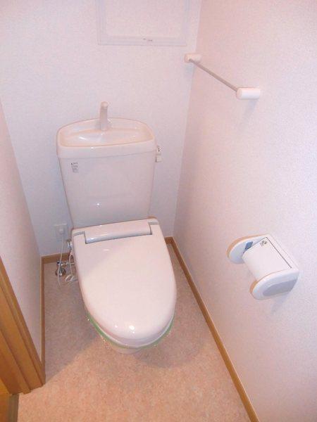 Toilet. Happy heating toilet seat in winter