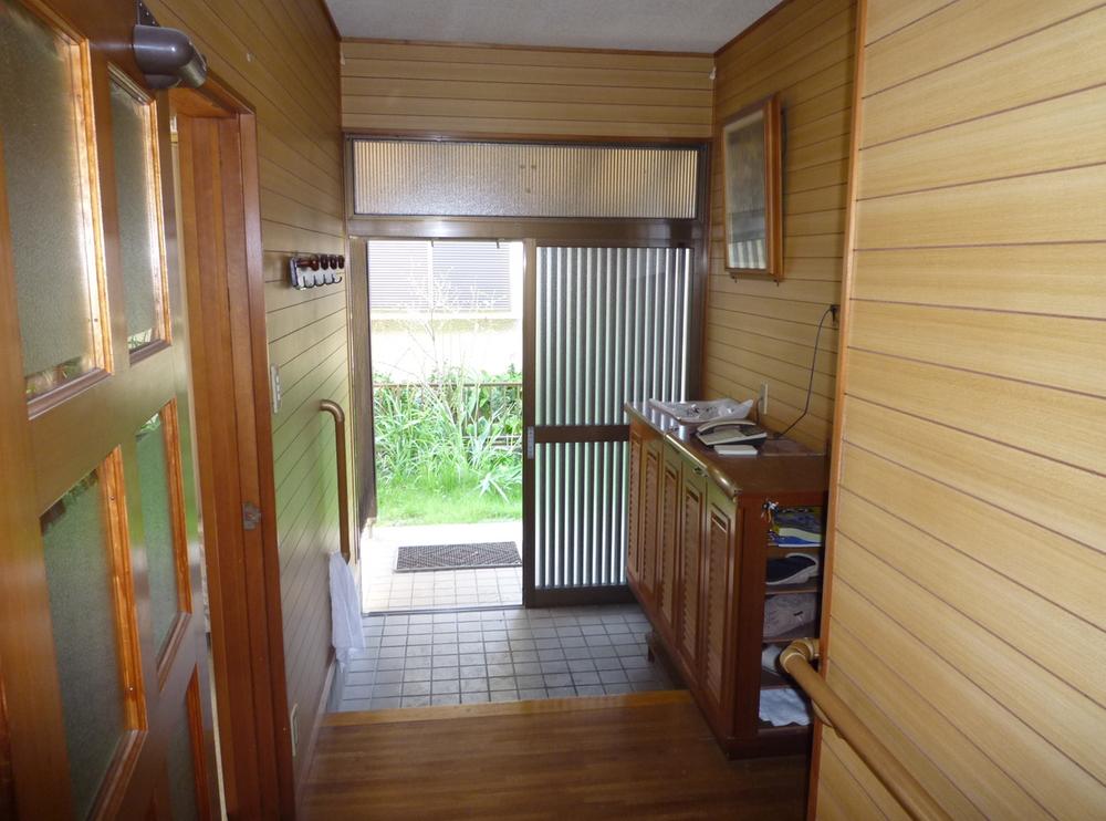 Entrance. Go to the front door from inside the house.