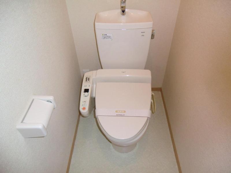 Toilet. Washlet is with