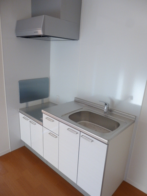 Kitchen. There is a refrigerator put space in the transverse