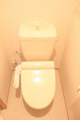 Toilet. Photos are separate properties but, It is identical to the property to recruit this time. But