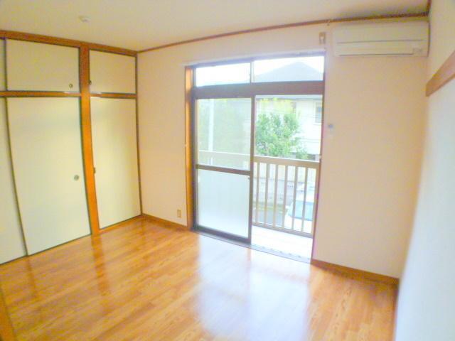 Living and room. South-facing is very bright Western-style.