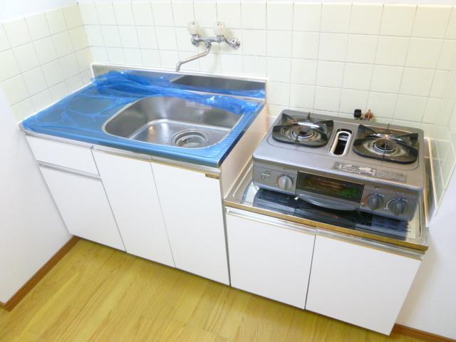 Kitchen. Yours peel off the plastic of the new kitchen.