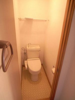 Toilet. Toilets are equipped with washlet (105, Room leaving product)