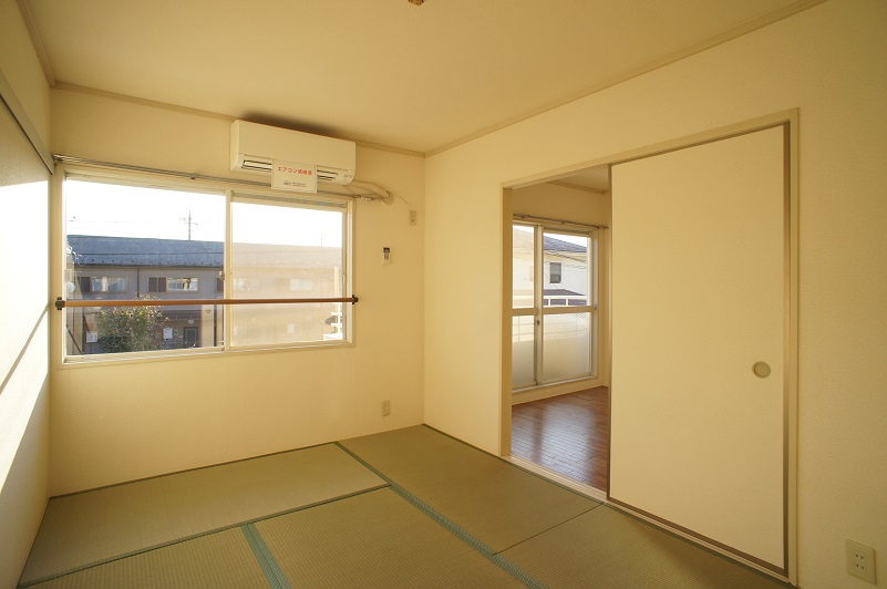 Living and room. The Japanese-style room comes with air conditioning