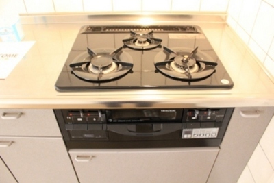 Kitchen. It is a three-necked gas stove