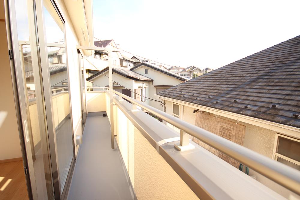 Balcony. Neighbor of the roof can be seen from the second floor balcony.