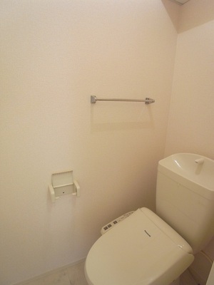 Toilet. Typical indoor photo Comfortable toilet with hot water washing heating toilet seat function. 