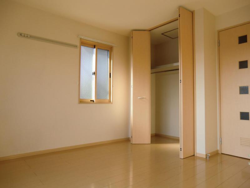 Living and room. It is a handy closet with a Western-style. 