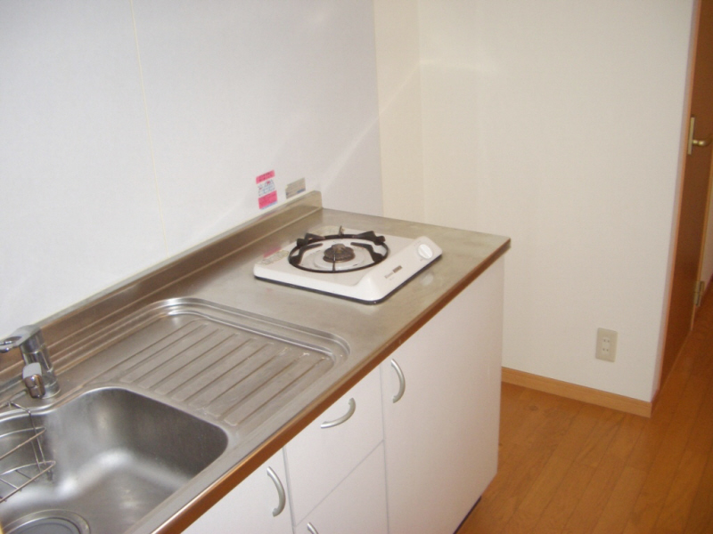 Kitchen. It is with gas stove.