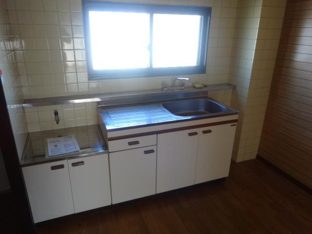 Kitchen. Two-burner gas stove can be installed spacious sink