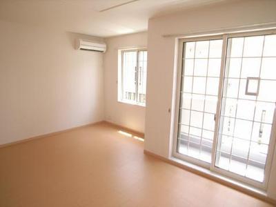 Living and room. It is very bright because the window is large