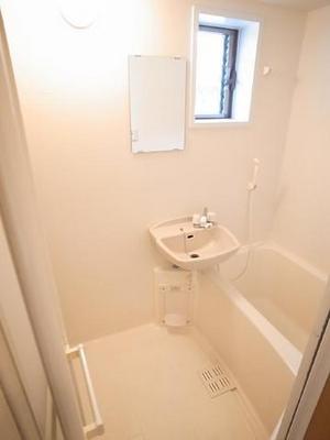 Bath. It is bright and convenient with the bath small window of the washbasin!