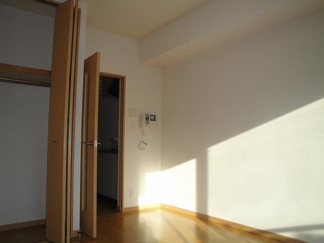 Living and room. It is a bright room.