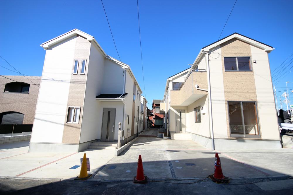 Local photos, including front road. Subdivision whole photo (all four buildings)
