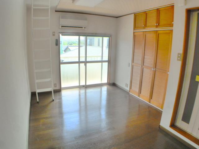 Living and room. It is spacious available room with a loft.