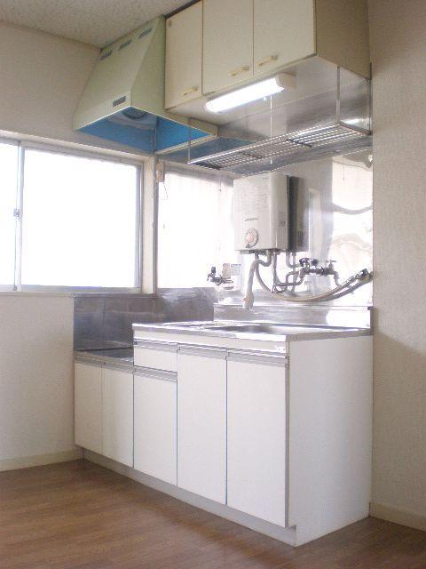 Living and room. In the kitchen hot water supply is kettle machine