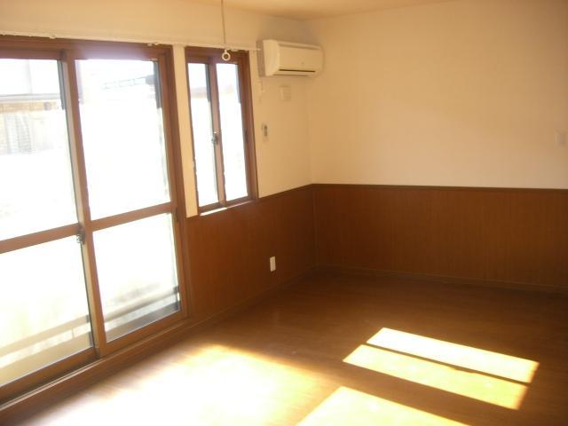 Living and room. It is very bright room.