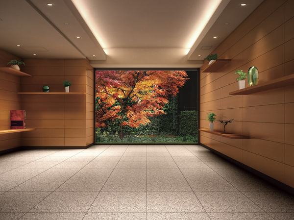 Features of the building.  [Entrance Hall found the richness of as space] Simple and consists of a modern shape and warm material entrance hall. In a space that incorporates a soft look of the courtyard of the trees, You can feel the day-to-day sense of the season. (Entrance Hall Rendering CG)