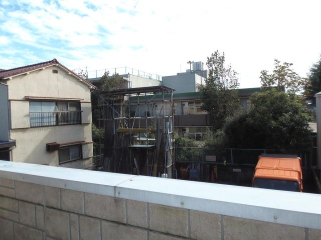 Balcony. Kitchen around spacious space.