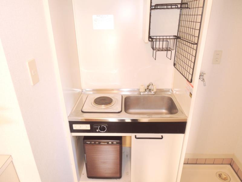 Kitchen. Mini-fridge in the kitchen, Laundry Area