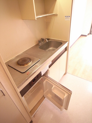 Kitchen. A kitchen with a mini-fridge!