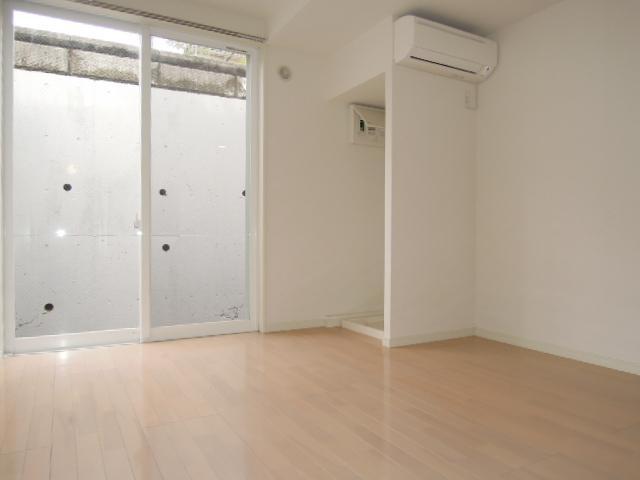 Washroom. It is a bright room with large windows.