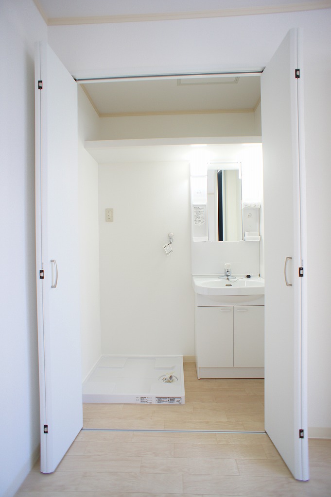 Washroom. When I opened the door, A washing machine storage and wash basin! ! !