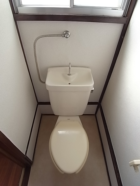 Toilet. Also there is a window in the toilet.