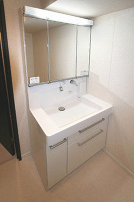 Washroom. Vanity of three-sided mirror