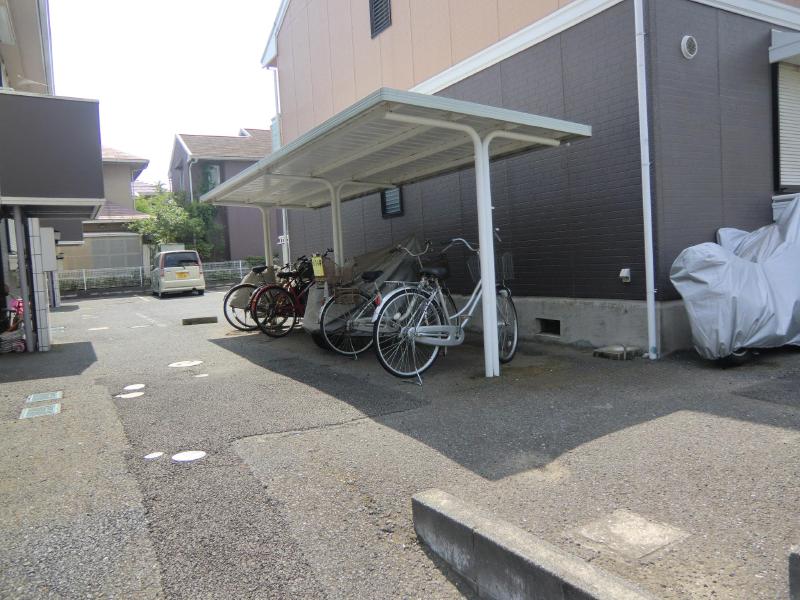 Other. Bicycle parking lot is equipped with roof