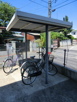 Security. It is a roof with bicycle parking