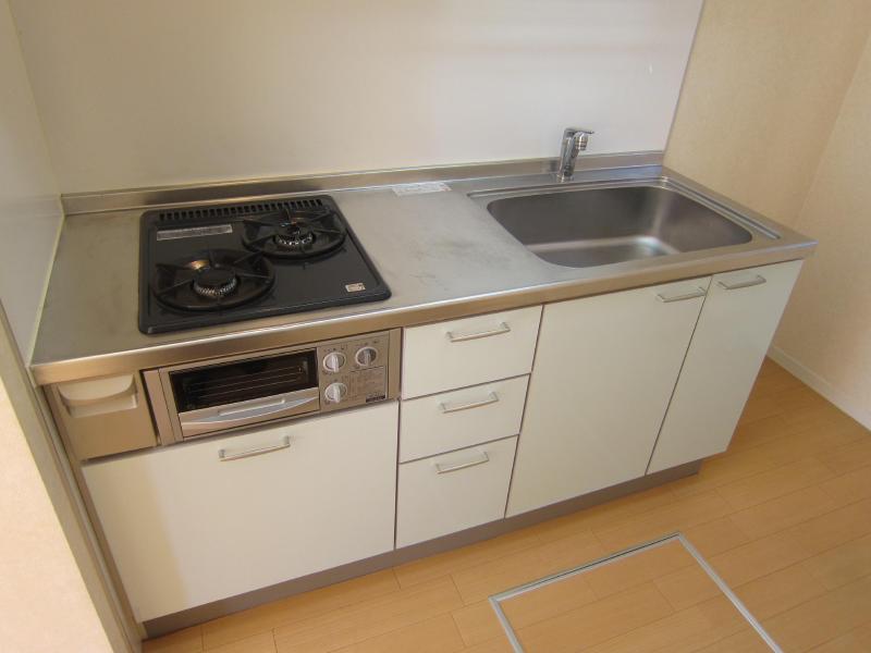 Kitchen. It is a clean comfortable two-neck system Kitchen