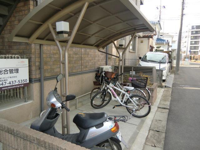 Other. Bicycle parking lot is equipped with roof