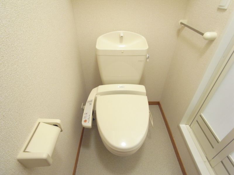 Toilet. Warm water washing toilet seat equipped!