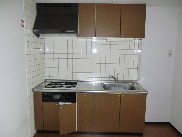 Kitchen. Also sufficient kitchen storage with a stove