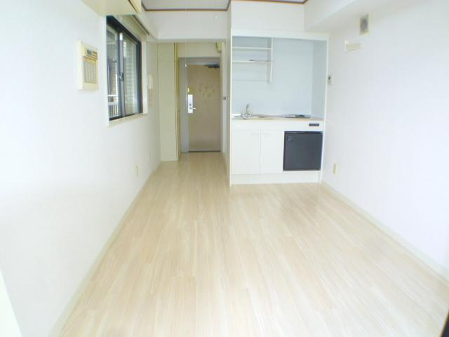 Living and room. Flooring is white is bright.