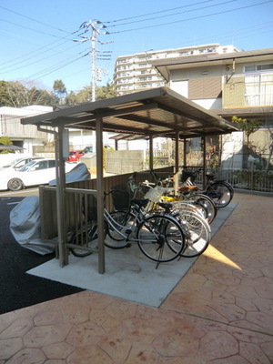 Security. It is a roof with bicycle parking