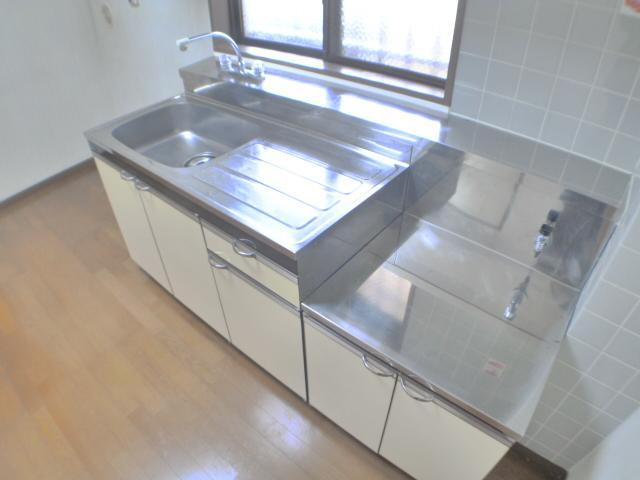 Kitchen. It is a two-burner stove definitive type of kitchen.