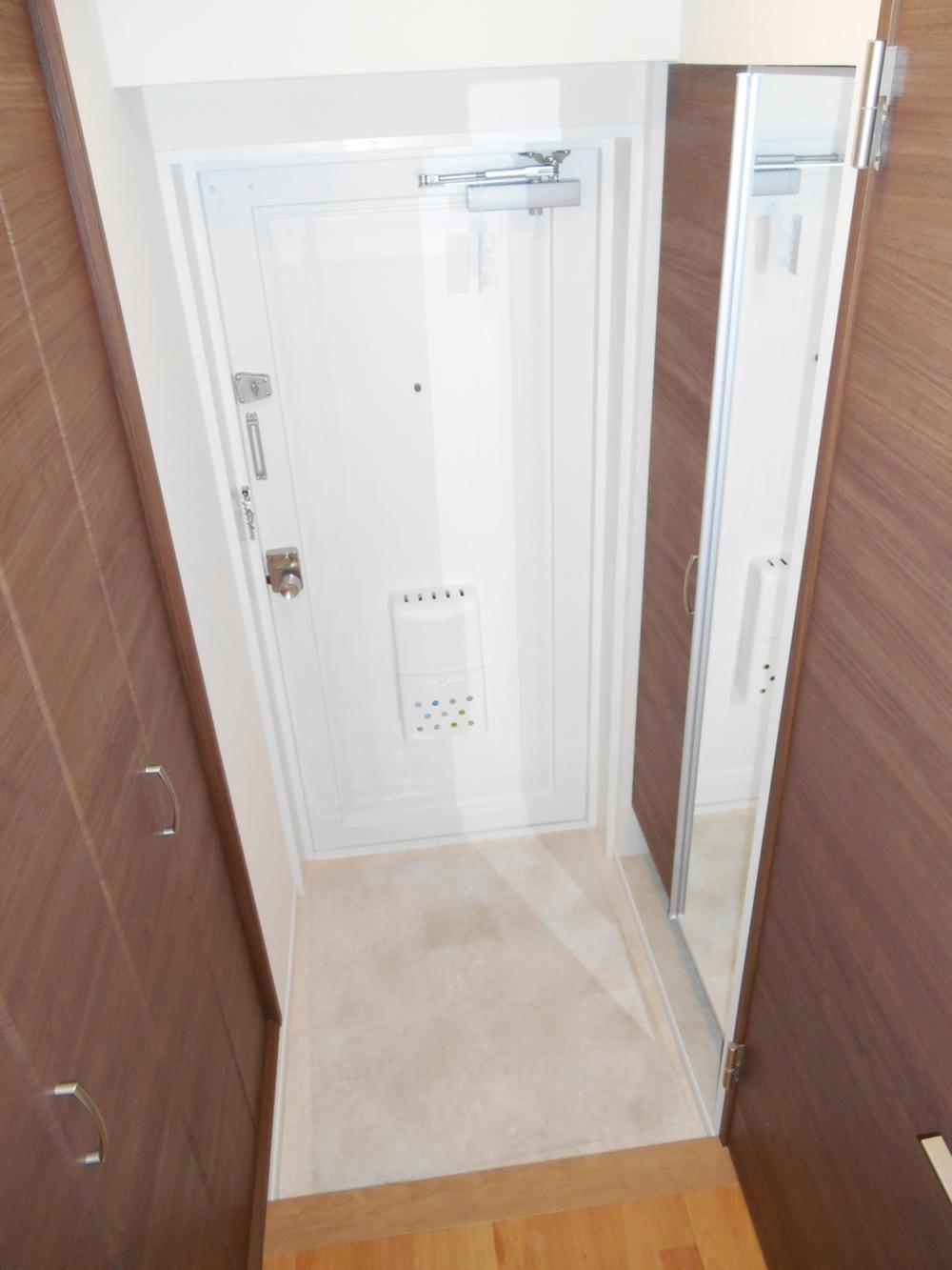 Entrance. It features a large shoe box