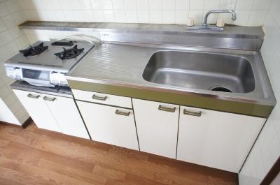 Kitchen. It is a two-necked gas stove installed base spacious kitchen.