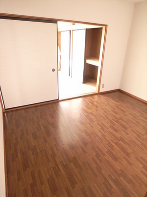 Living and room. Is the flooring of shiny