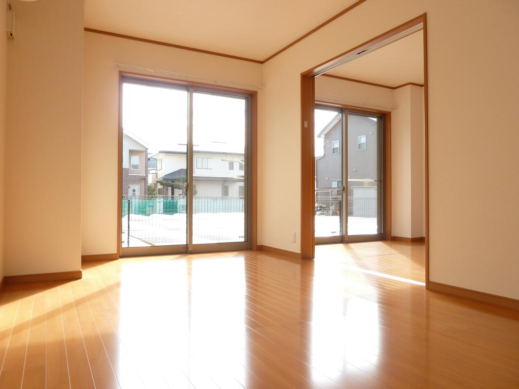 Living and room. Large windows is bright and airy.