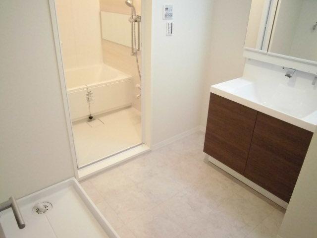 Wash basin, toilet. It is the washroom