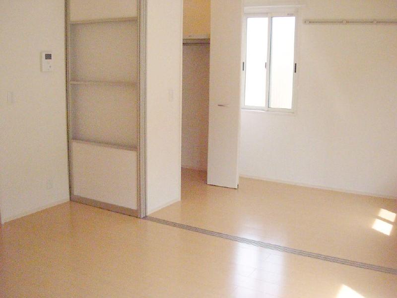 Living and room. Large closet and bed space is next door!