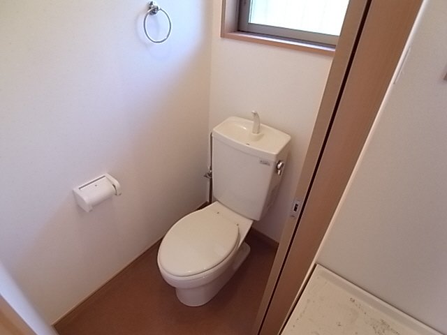 Toilet. There is a small window, Bright ventilation is good space