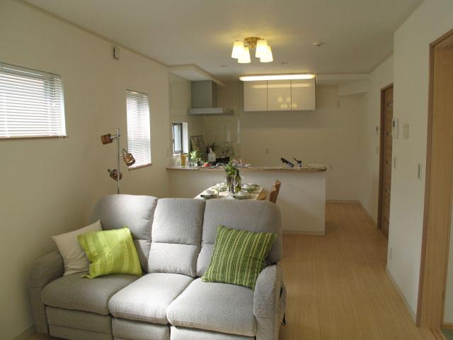 Living. Furnished model building, Now open.