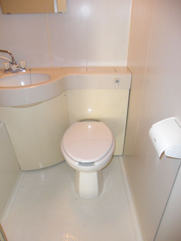 Toilet. There is room in the feet