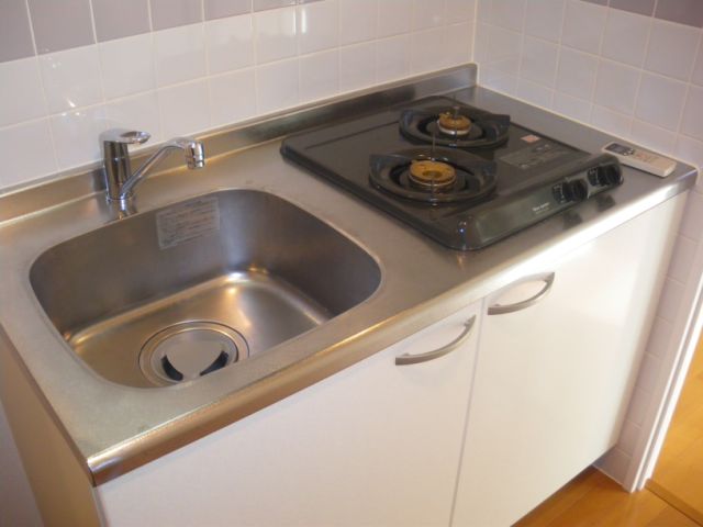 Kitchen. It is with gas stove. 