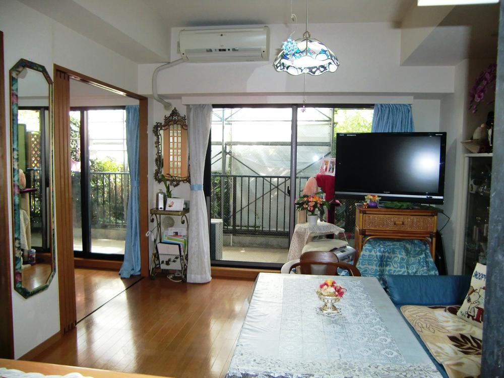 Living. Living Sun Room is facing!